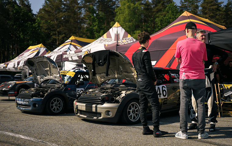Team of mechanics preparing MINI Cooper for track session